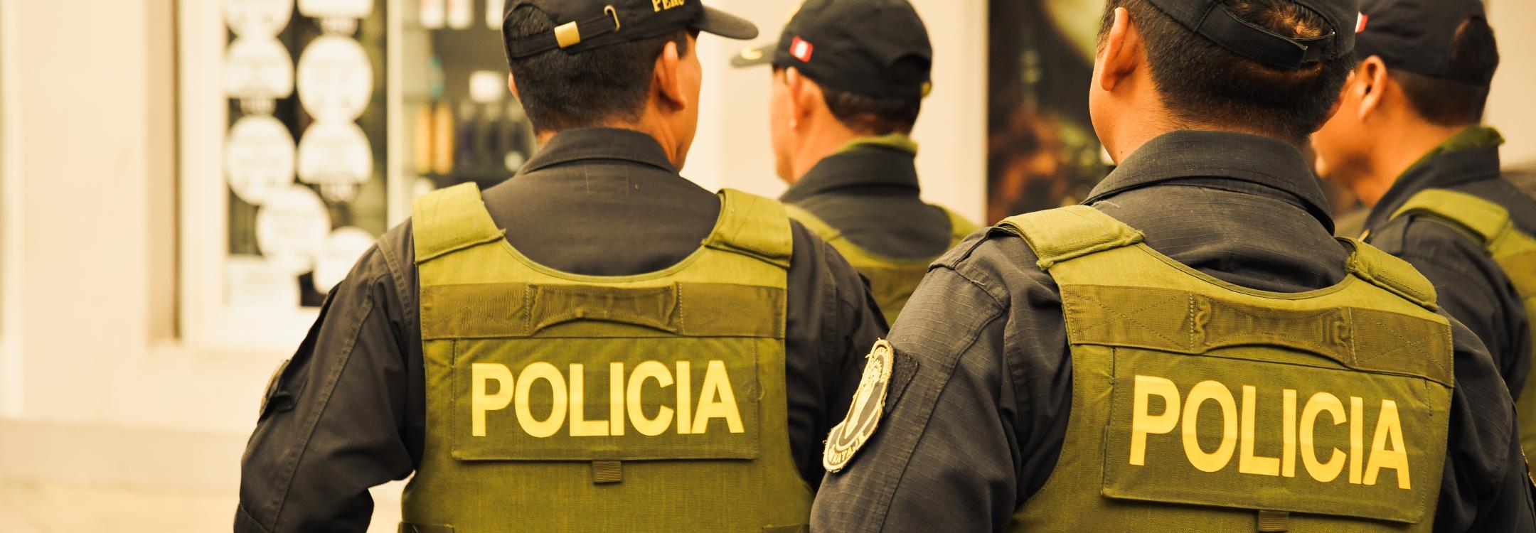 Police officers seen from behind